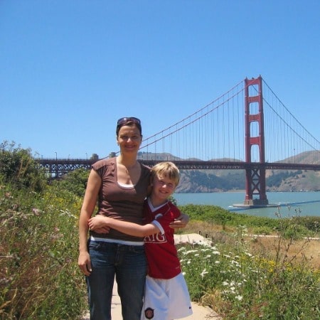 Childhood picture of Faze Blaziken hugging his mom, Hemma Mosing near Golden Bridge. How old is Blaziken as of now?